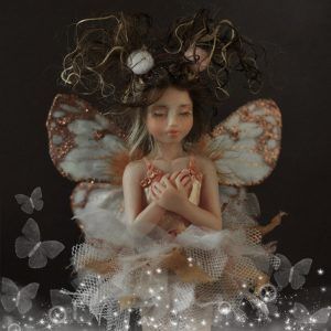 Dreaming Fairy with glitter wings and tutu dress.